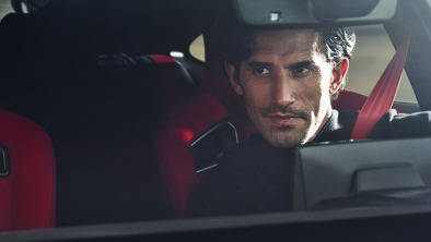 Face of a man sitting in a Civic Type R.